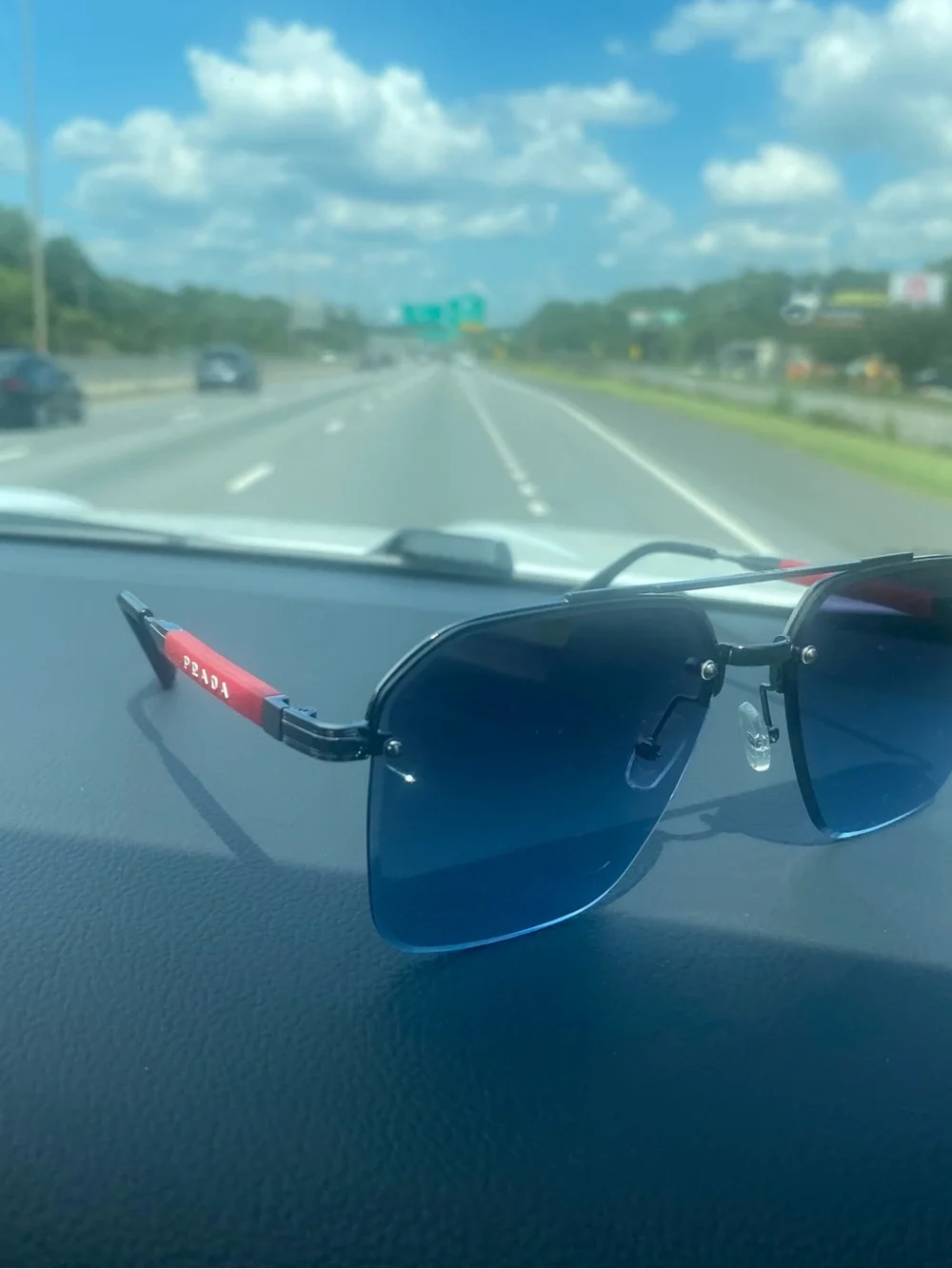 Prada Blue Gradient Rimless Sunglasses with Red Temples